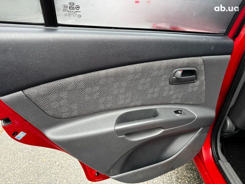 Kia Rio 2008 красный - фото 21