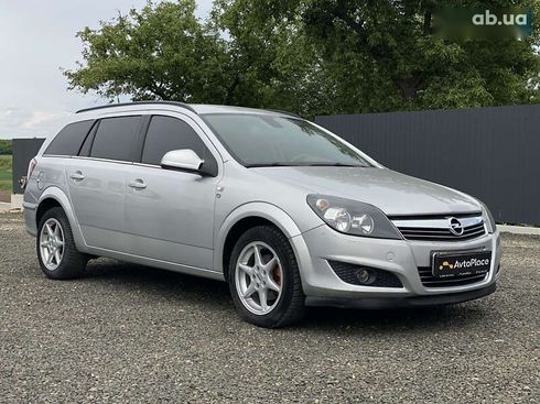 Opel Astra 2010 - фото 30