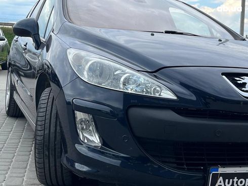 Peugeot 308 2010 синий - фото 13