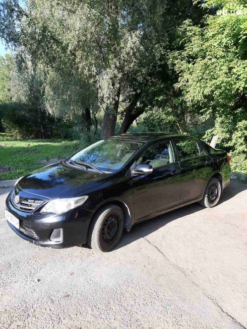 Toyota Corolla 2010 черный - фото 3