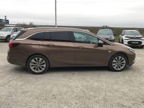Opel Astra 2016 коричневый - фото 11