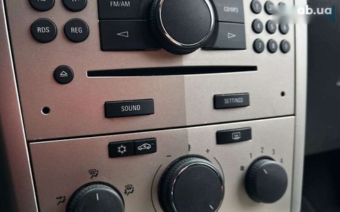 Opel Astra 2008 - фото 14