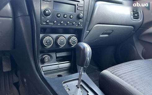 Nissan Almera 2009 - фото 11