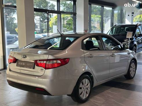 Kia Rio 2012 - фото 12