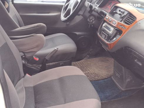 Mitsubishi L 400 2000 белый - фото 9