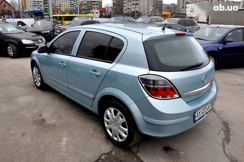 Opel Astra 2009 - фото 11