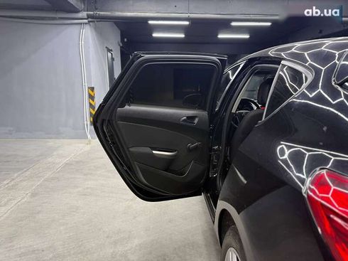 Opel Astra 2010 - фото 16