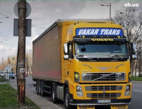 Volvo FH 12 2005 желтый - фото 3