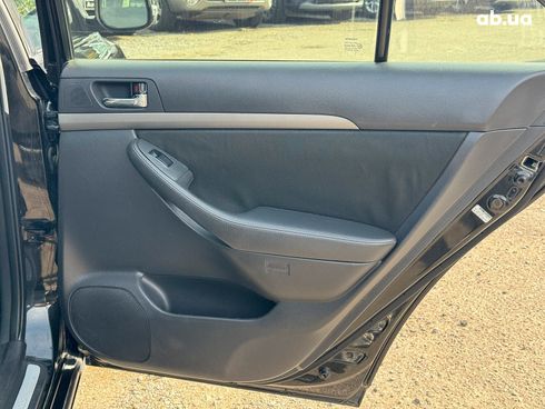 Toyota Avensis 2007 черный - фото 56