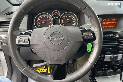 Opel Astra 2010 - фото 14