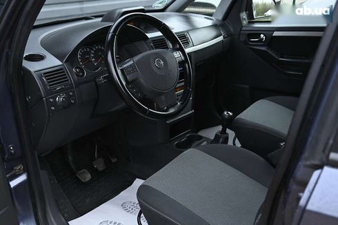 Opel Meriva 2009 - фото 17