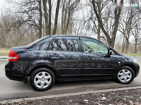 Nissan Tiida 2012 - фото 27