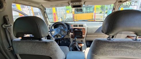 Nissan Patrol 2007 зеленый - фото 5