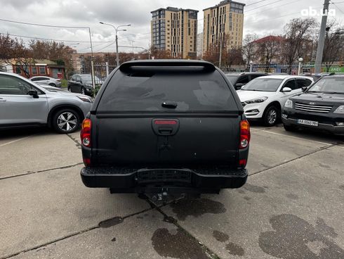 Mitsubishi l 200 2009 черный - фото 5