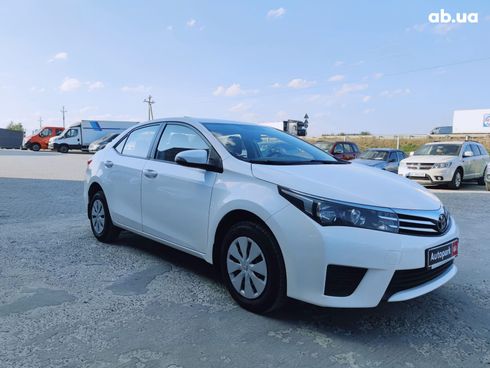 Toyota Corolla 2014 белый - фото 12