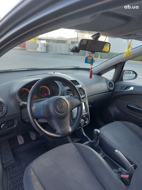 Opel Corsa 2010 синий - фото 5