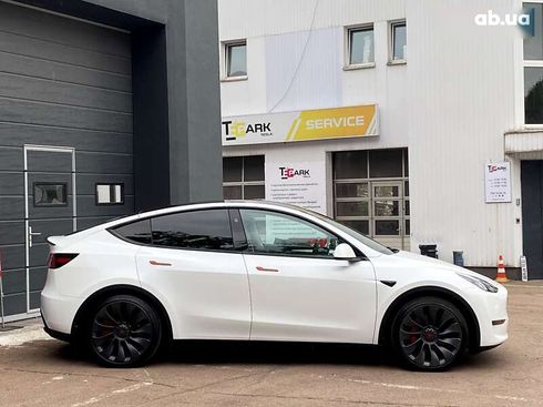 Tesla Model Y 2024 - фото 11