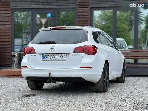 Opel Astra 2014 - фото 12