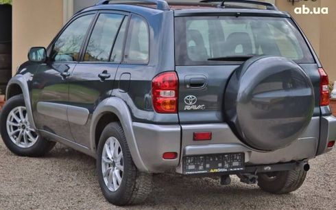 Toyota RAV4 2004 серый - фото 6