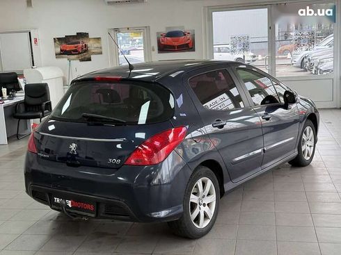Peugeot 308 2012 - фото 14