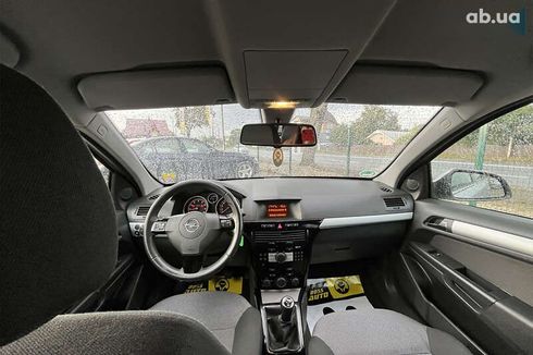 Opel Astra 2010 - фото 23