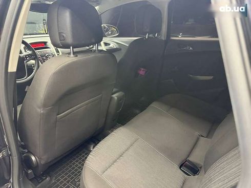 Opel Astra 2010 - фото 14