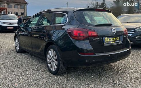 Opel Astra 2011 - фото 4