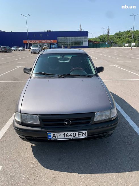 Opel Astra 1992 серый - фото 3