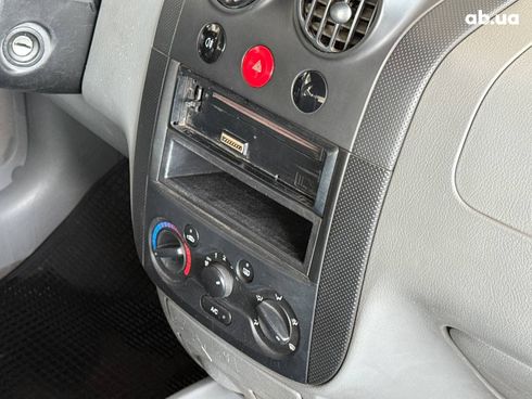 Chevrolet Aveo 2005 серый - фото 12