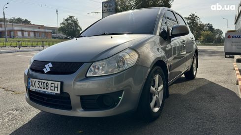 Suzuki SX4 2008 серый - фото 7