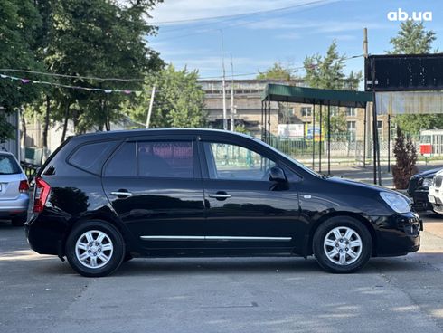 Kia Carens 2008 черный - фото 6