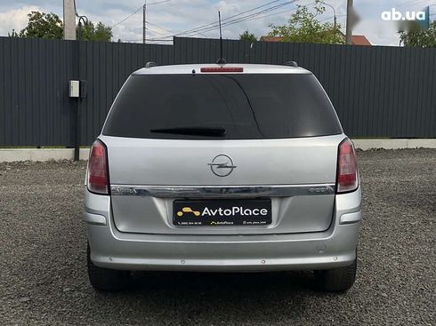 Opel Astra 2010 - фото 20