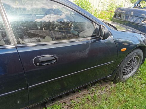 Mazda 323 1998 синий - фото 7