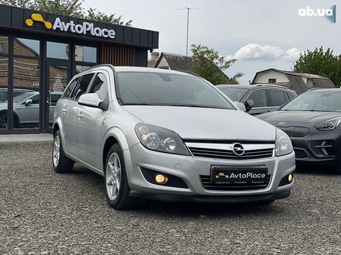 Opel Astra 2010 - фото 19