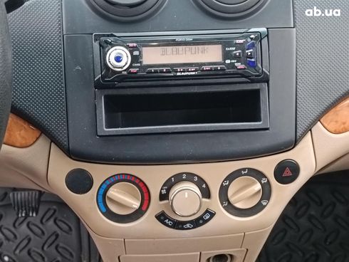 Chevrolet Aveo 2008 оранжевый - фото 31