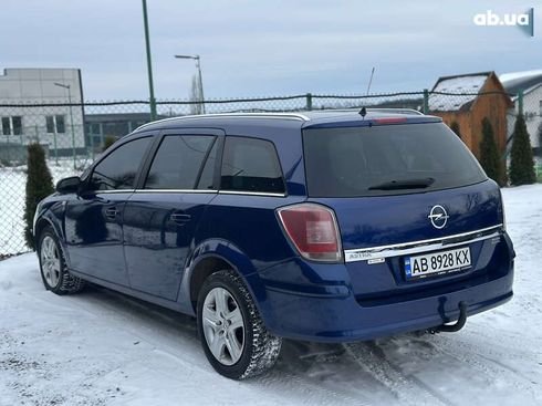 Opel Astra 2010 - фото 18
