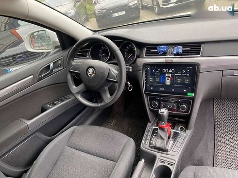 Skoda Superb 2014 - фото 9