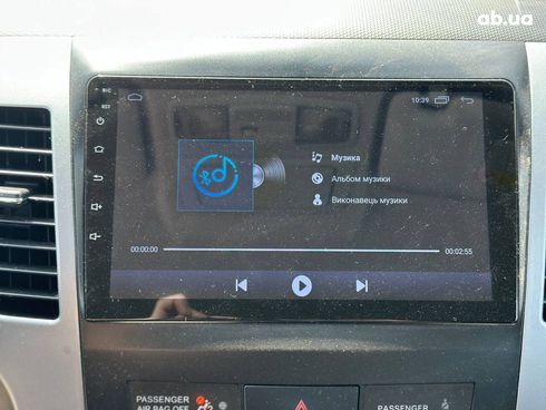 Mitsubishi Outlander XL 2010 черный - фото 25
