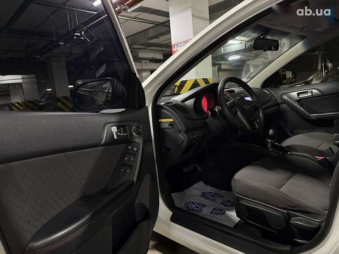 Kia Cerato 2011 - фото 13