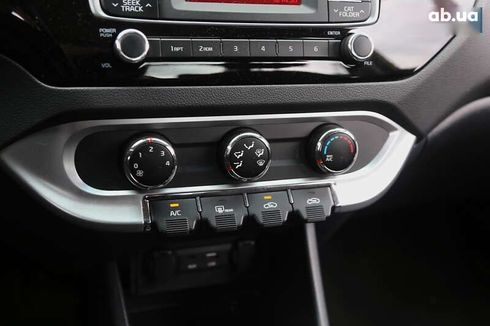 Kia Rio 2015 - фото 17