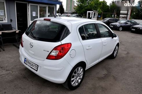 Opel Corsa 2012 - фото 12