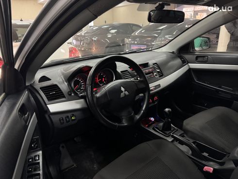 Mitsubishi Lancer 2008 серебристый - фото 9