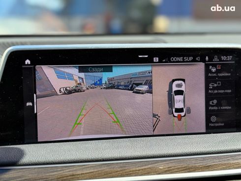 BMW 7 серия 2019 белый - фото 37