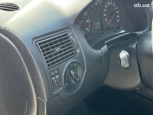 Volkswagen Golf 2001 черный - фото 9