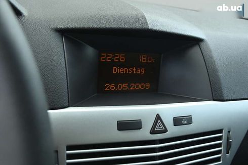 Opel Astra 2009 - фото 21