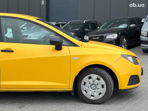 SEAT Ibiza 2011 желтый - фото 4