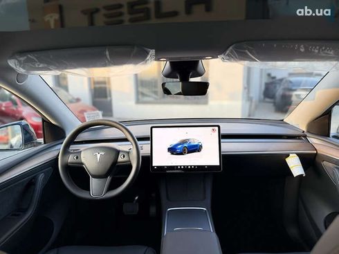 Tesla Model Y 2024 - фото 27