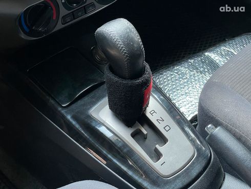 Mitsubishi Lancer 2003 черный - фото 15
