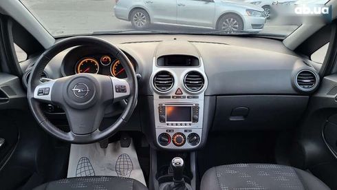 Opel Corsa 2013 - фото 23