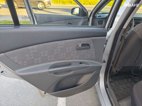 Kia Rio 2008 серебристый - фото 18